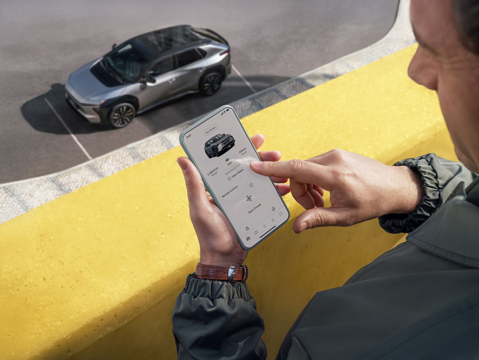 A Toyota bZ owner using their MyToyota app