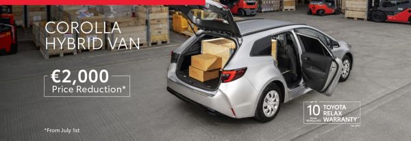 Toyota Corolla Commercial driving on road