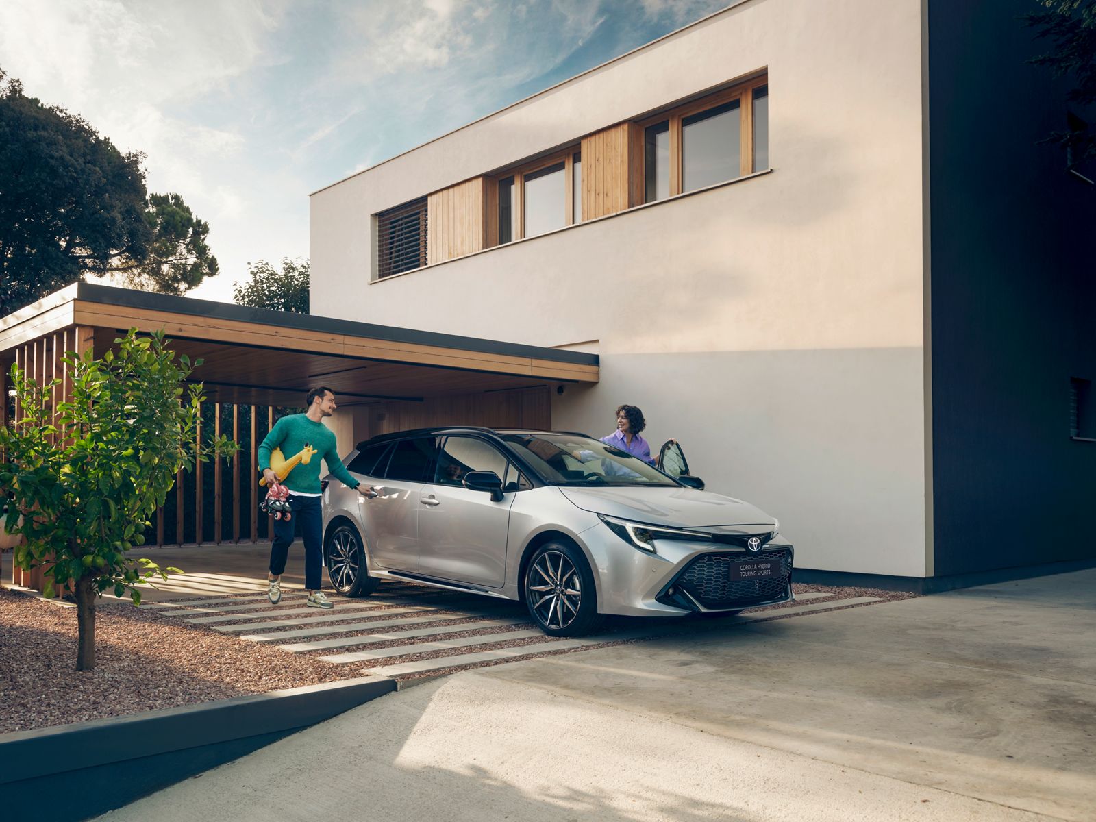 A Corolla Touring Sports owner with their car