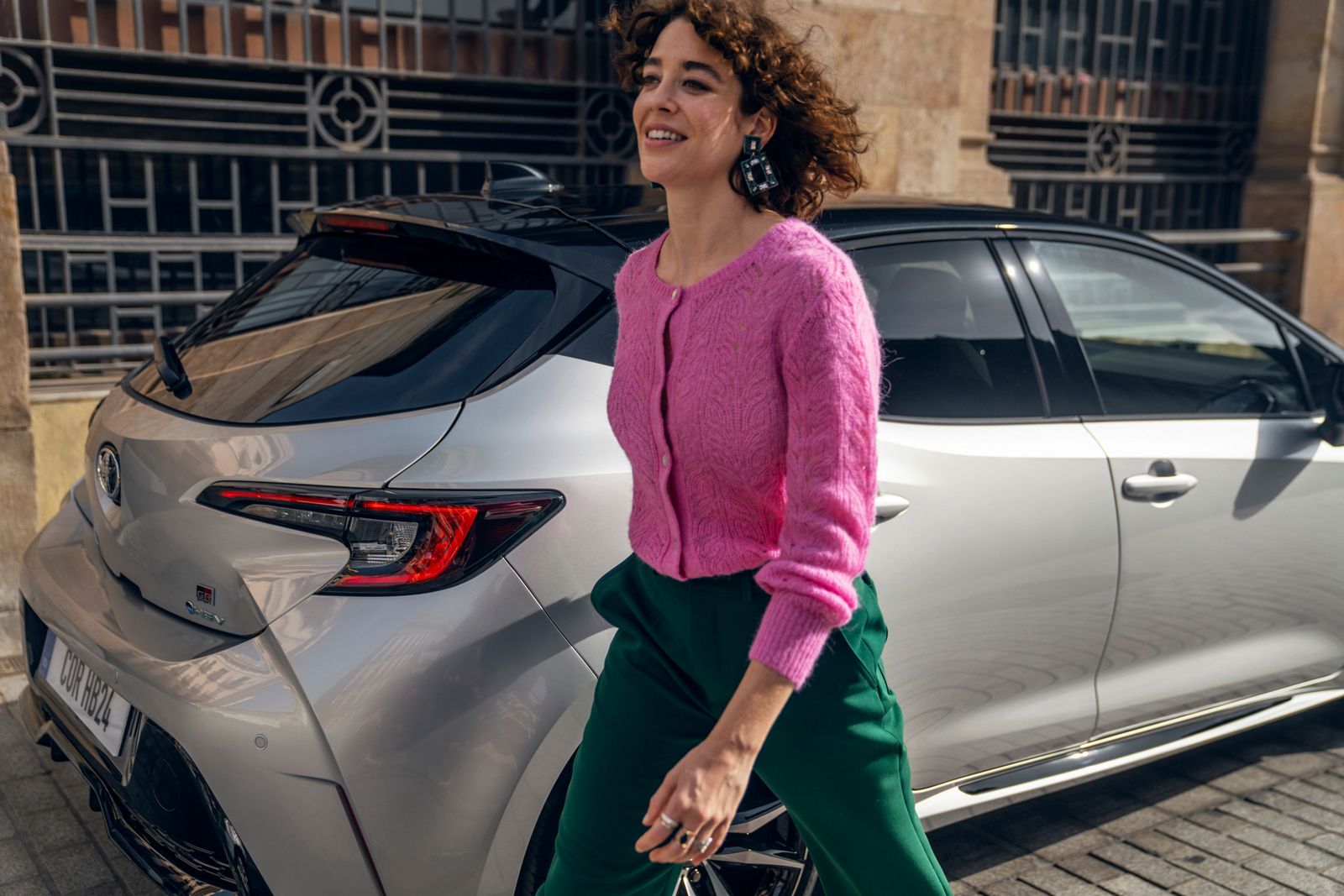  An owner with their Toyota Corolla Hatchback