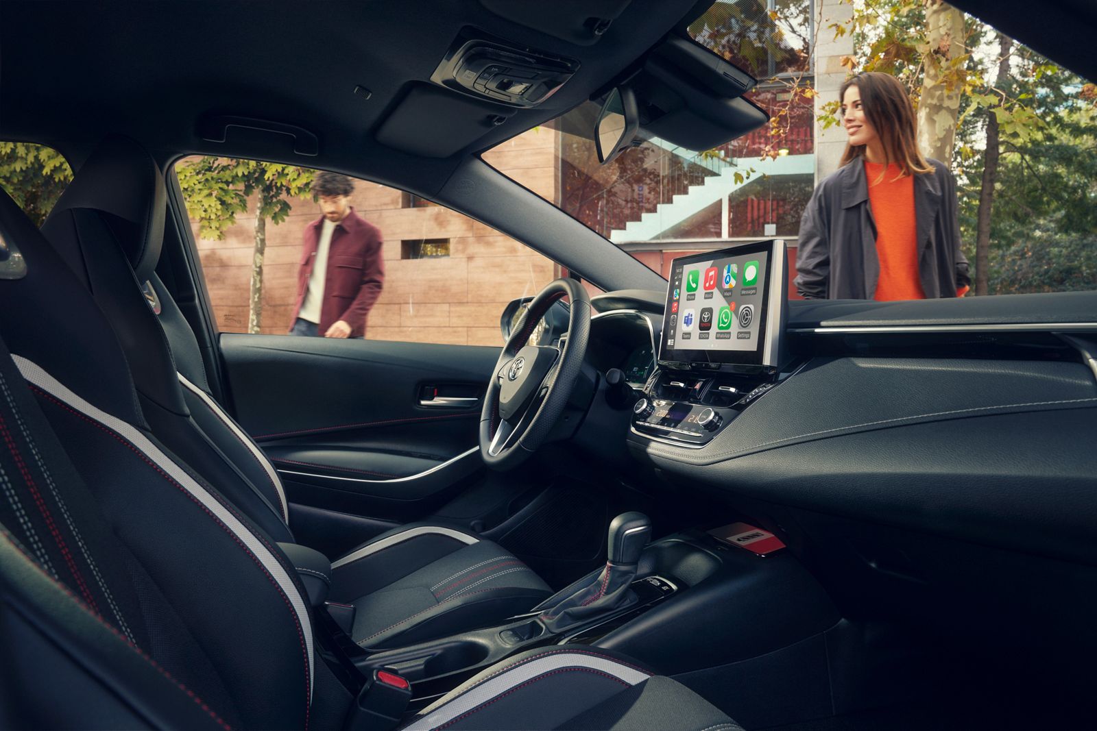 The Toyota Corolla Sedan’s steering wheel and multimedia touchscreen
